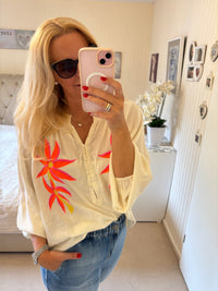 Tunika mit Neonblumenstickerei