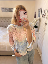 Regenbogenpullover