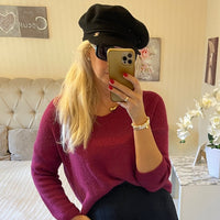 Wollmütze mit silberner Schnalle